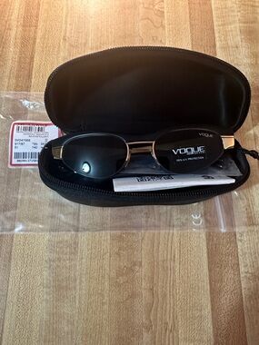 Vogue Black Oval Sunglasses with Gold Bridge Gigi Hadid